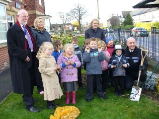 Saltburn primary children planting bulbs.